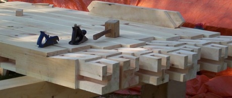 Traditional beams are cut to slot together, and wooden dowels hold them in place.
